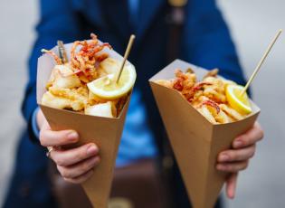 frittura di pesce. Fried seafood. Street food in Italy.